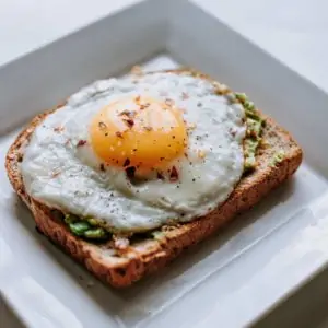 A sunny side up egg on toast