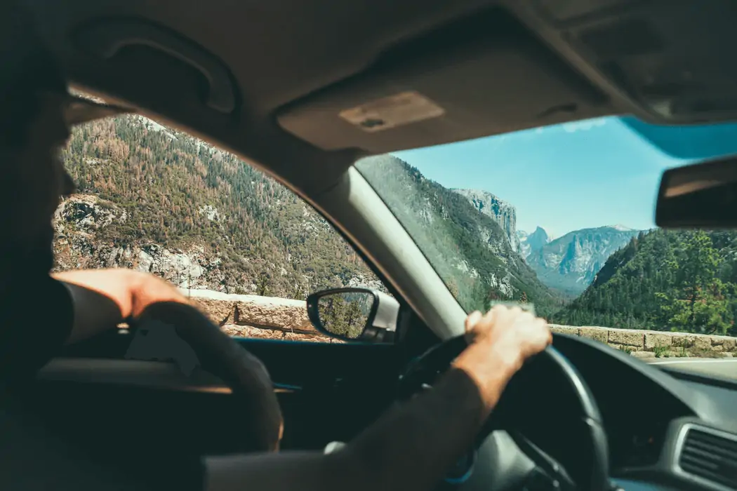 Person driving through mountains