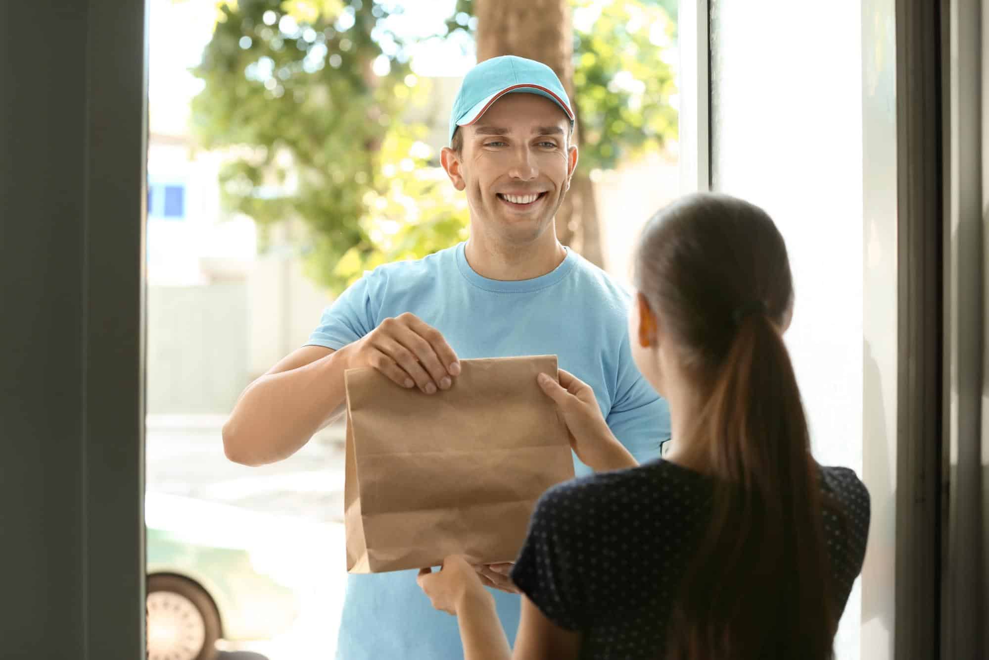 What is Prime Now: Man delivering goods to customer at doorway