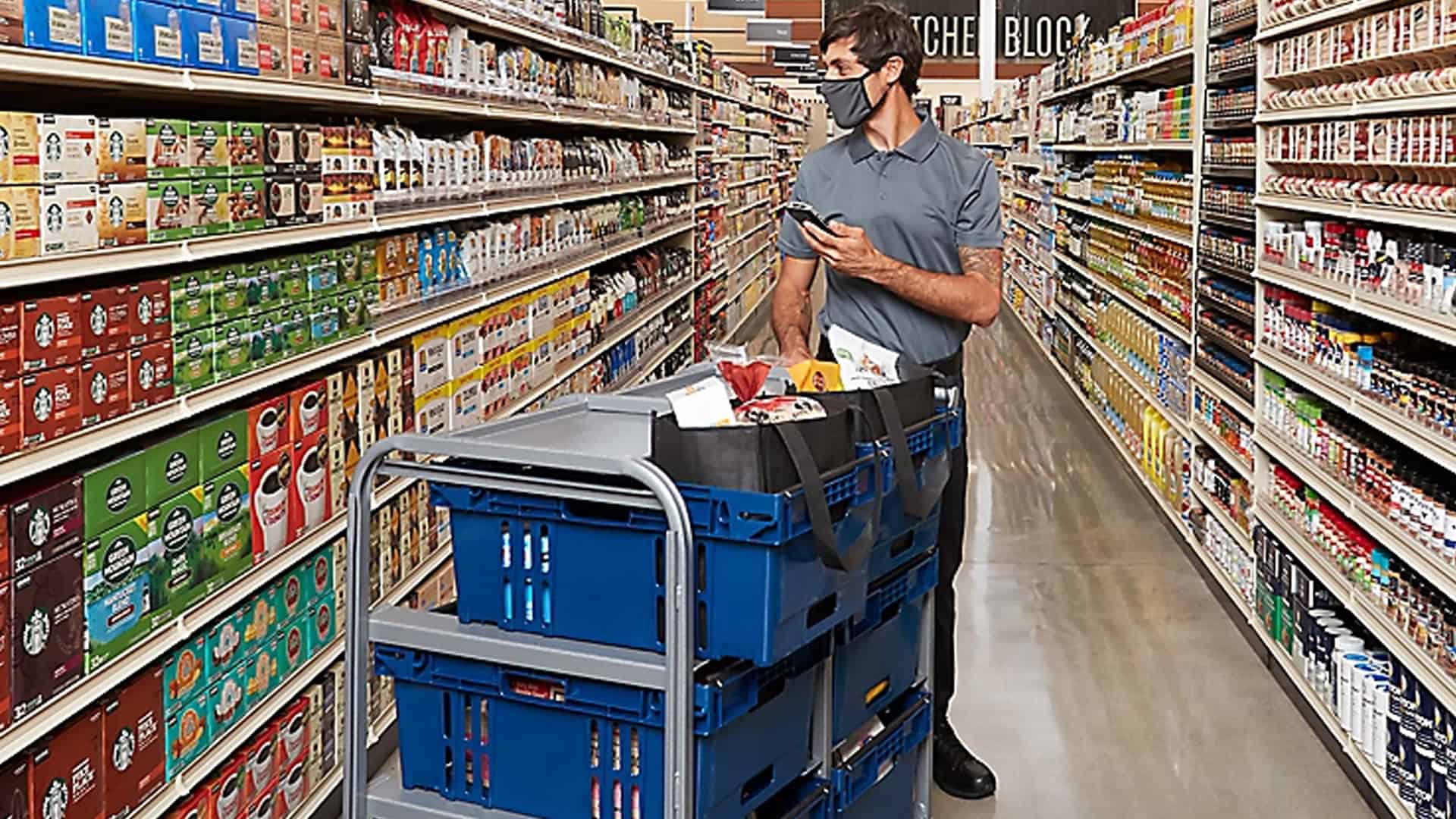 image of safeway grocery delivery picker shopping for groceries inside store