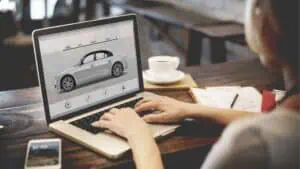 header graphic showing a woman flipping cars online