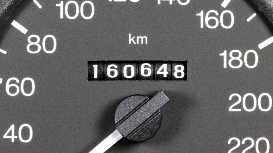 image showing a vehicle's odometer - header graphic for "how many miles can a car last" post on ridester.com
