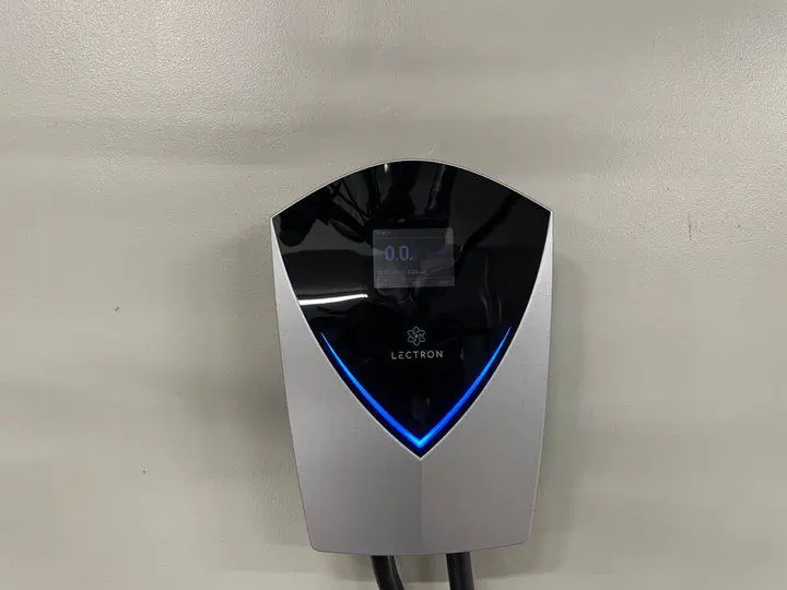 Lectron V-Box 48A EV Charging Station review - installation showing charger installed on the inside of a garage wall with the screen showing 0 amps on the screen